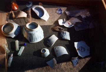 Sherds of bamboo ware and other pottery, medicine vials, a marble. Photo: Irene Rutledge